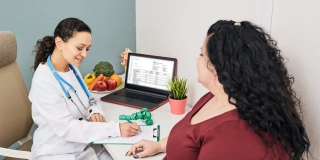 Obesity, unhealthy weight. Nutritionist calculating body mass index of fat woman for obesity treatment.