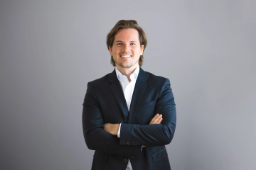 Dr. Felix Schulz, OMMAX.